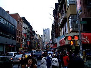 Crossing Canal Street in Chinatown, facing Mott Street toward the south