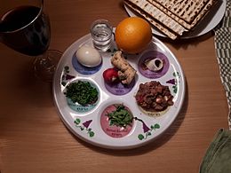 Passover Seder plate with wine and matzot