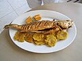 Patacones and fried corvina