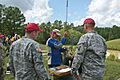 A member of Team USA loading his blackpowder rifle at the 2015 MLAIC Long Range Championship