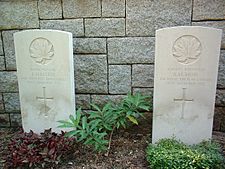 Graves of Canadian soldiers (Pvt. J. Maltese, Winnipeg Grenadiers and Rifleman A.M. Moir, Royal Rifles of Canada)
