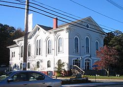 Holliston Town Hall on the east border of the town green