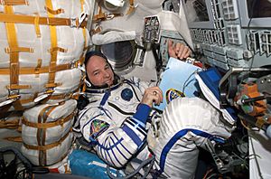 Jeffrey Williams inside the Soyuz TMA-8 spacecraft