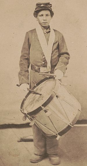 Taylor, young drummer boy for 78th Colored Troops Infantry, in uniform with drum LCCN2017659602 (cropped)