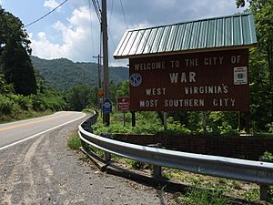 2017-07-22 12 09 09 "Welcome to the City of War" sign along southbound West Virginia State Route 16 (Main Street) at Excelsior A Road (McDowell County Route 102-08) in War, McDowell County, West Virginia.jpg