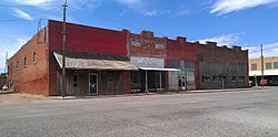 A row of buildings south of the Stonewall County Courthouse in Aspermont, Texas