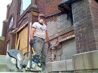 Man doing brick repair