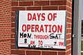 FEMA - 42163 - Hours-days of operation sign at the Disaster Recovery Center