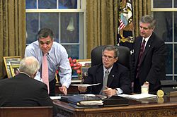 George Tenet gives a briefing to George W. Bush