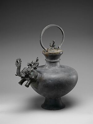Lid with seated male figure, Gandhara, Pakistan