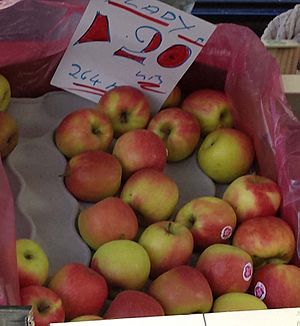 Pink Lady apples for sale on a UK greengrocer's market stall in August 2013