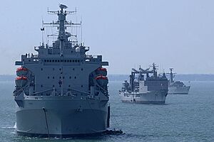RFA Argus, FS Meuse and RS Regina Maria at anchor in the Solent, in readiness for the International Fleet Review. MOD 45145024