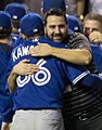 Alex Anthopoulos hugs Munenori Kawasaki