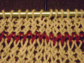 Knitting plaited stitches fabric