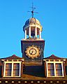 Thomas Wall Centre clock lit up in the evening sun, SUTTON, Surrey, Greater London (4)