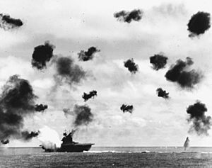 USS Yorktown (CV-5) is hit by a torpedo on 4 June 1942