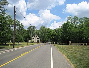 Approaching the center of Arneytown on eastbound CR 664