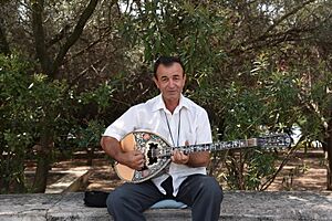 DSC 3510 athens Bouzouki player street july 2018
