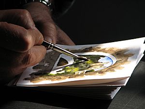 Dolceacqua43 - Artista locale mentre dipinge un acquarello