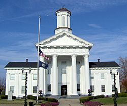 Madison County courthouse, Richmond, with flags at half-staff in honor of Veterans Day (2007).