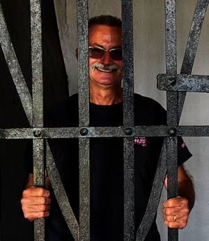 Mayor Mike Serena in the Gardner, Illinois historic two-celled jail (31 May 2024, 2 of 2, cropped)