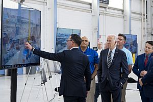 President Joe Biden watches as Pennsylvania Governor Josh Shapiro explains details of the Interstate 95 highway collapse after an aerial tour of the site at Philadelphia International Airport in Philadelphia
