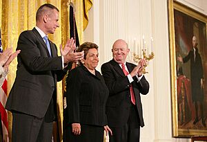 Donna Shalala is applauded by fellow recipients of the Presidential Medal of Freedom