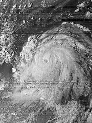 Low-resolution satellite image of a tropical cyclone to the east of Central America