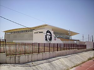 The multi-purpose building of Marinaleda, adorned with a portrait of Ernesto Che Guevara
