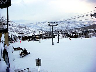 The base of Snowmass Mountain, including a view of Snowmass Village