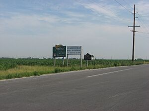 Historical marker and advertising near Francesville