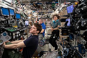 ISS-59 Anne McClain, David Saint-Jacques and Christina Koch inside the Destiny lab