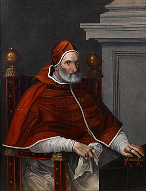 Portrait of Pope Pius IV, three-quarter-length, seated at a draped table (Circle of Scipione Pulzone)
