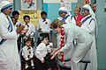 The First lady of USA, Ms. Laura Bush interacting with the disabled children on her visit to Mother Teresa Light of Life Home (Jeevan Jyothi) for disabled children, in New Delhi on March 2, 2006
