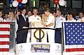 US Navy 040601-N-6371Q-096 Vice Adm. Gary Roughead, right, rings the opening bell at the American Stock Exchange, during the 17th Annual Fleet Week in New York
