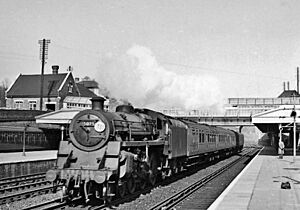 Weybridge Waterloo - Basingstoke train passing geograph-2670448-by-Ben-Brooksbank