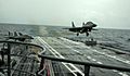 A MiG-29K performs a touch and go landing on INS Vikramaditya during Narendra Modi's visit