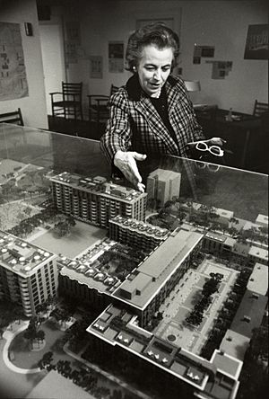 Architect Chloethiel Woodard Smith presenting a model of her Harbour Square project for Southwest Washington, D.C.jpg