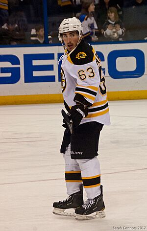 Brad Marchand playing with the Boston Bruins during a February 22, 2012 away game against the St. Louis Blues at the Scottrade Center in St. Louis (6831832878)
