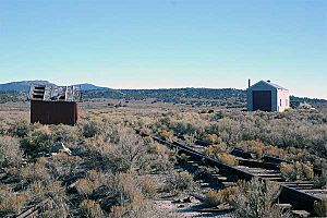 Surviving buildings in Cobre (September 2007). Both buildings were owned by the Nevada Northern Railway; the structure on the left is a handcar shed, and the structure on the right is an engine house.