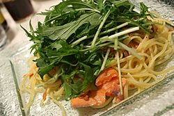 Mizuna and pasta and salmon