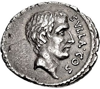 Grey coin with male head facing right