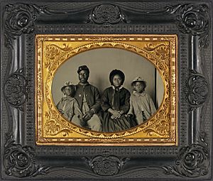 Sgt. Samuel Smith, African American soldier in Union uniform with wife and two daughters