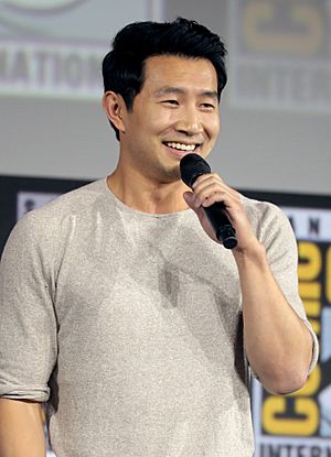 Simu Liu speaking at the San Diego Comic-Con International in 2019