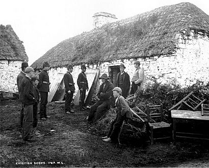 Family evicted by their landlord during the Irish Land War c1879.jpg