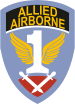 A blue shield with the word "Allied Airborne" on a black background near the top. The centre of the shield contains a white number one with yellow wings. At the bottom, a pair of crossed gladiator swords point down, on a purple-red background.