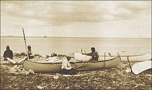 Innu making canoes near Sheshatshiu, ca. 1920