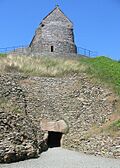 La Hougue Bie entrance and chapel, Jersey.jpg