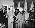 Photograph of Dean Acheson taking the oath of office as Secretary of State in the Oval Office, with Chief Justice... - NARA - 200076