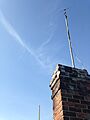 Rabbit ear dipole antenna rooftop elevated